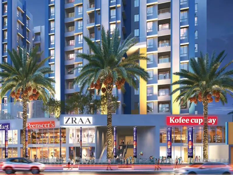 Commercial plaza at the project entrance at dusk