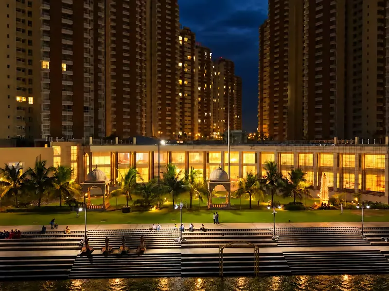 Clubhouse and riverside ghat steps lit at night