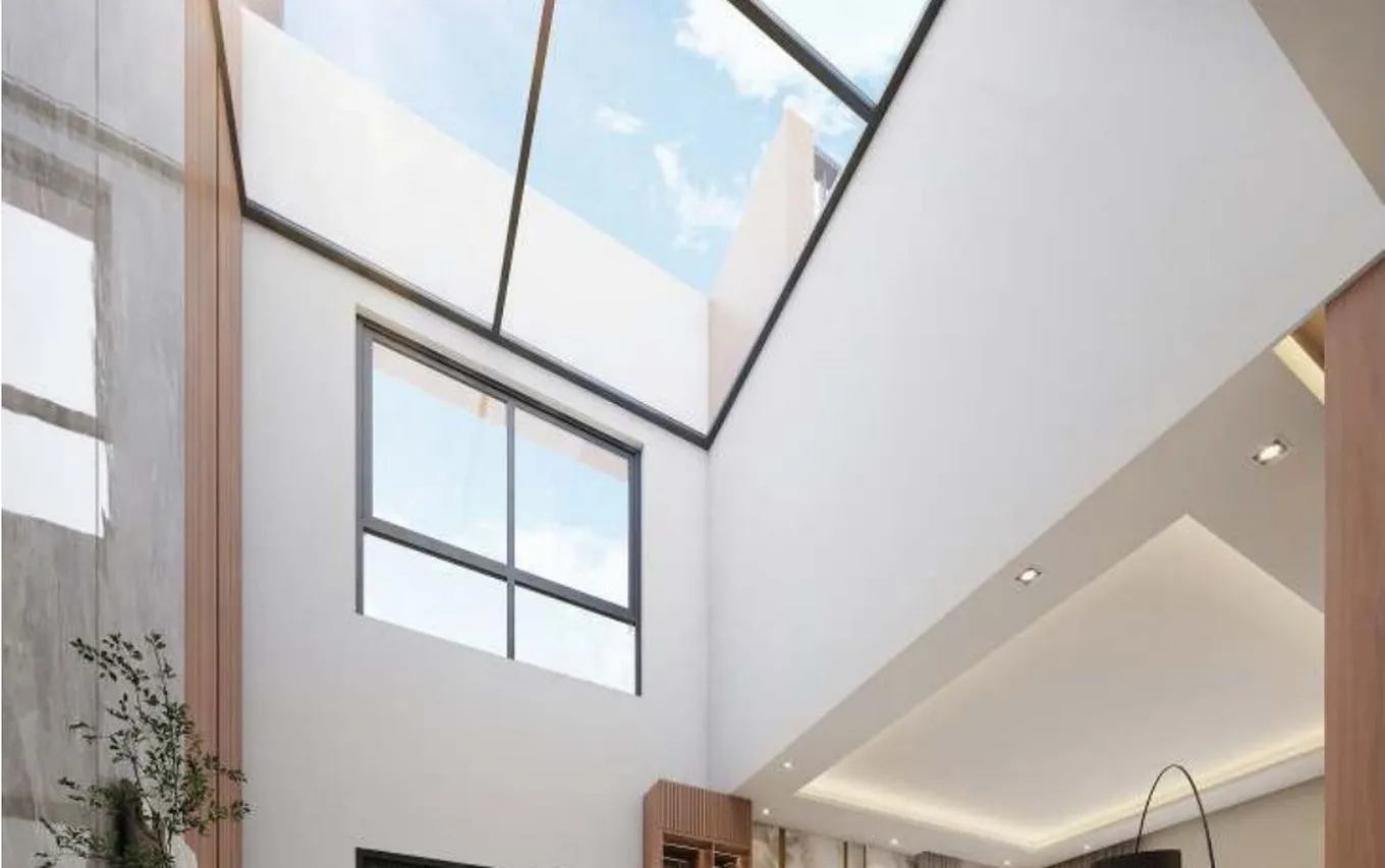 Private skylight over the double-height dining area