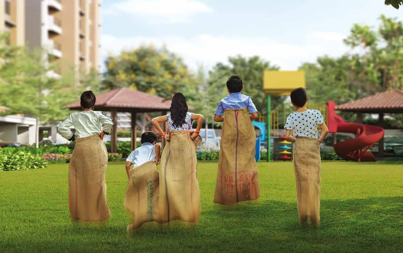 Children playing on the landscaped lawn