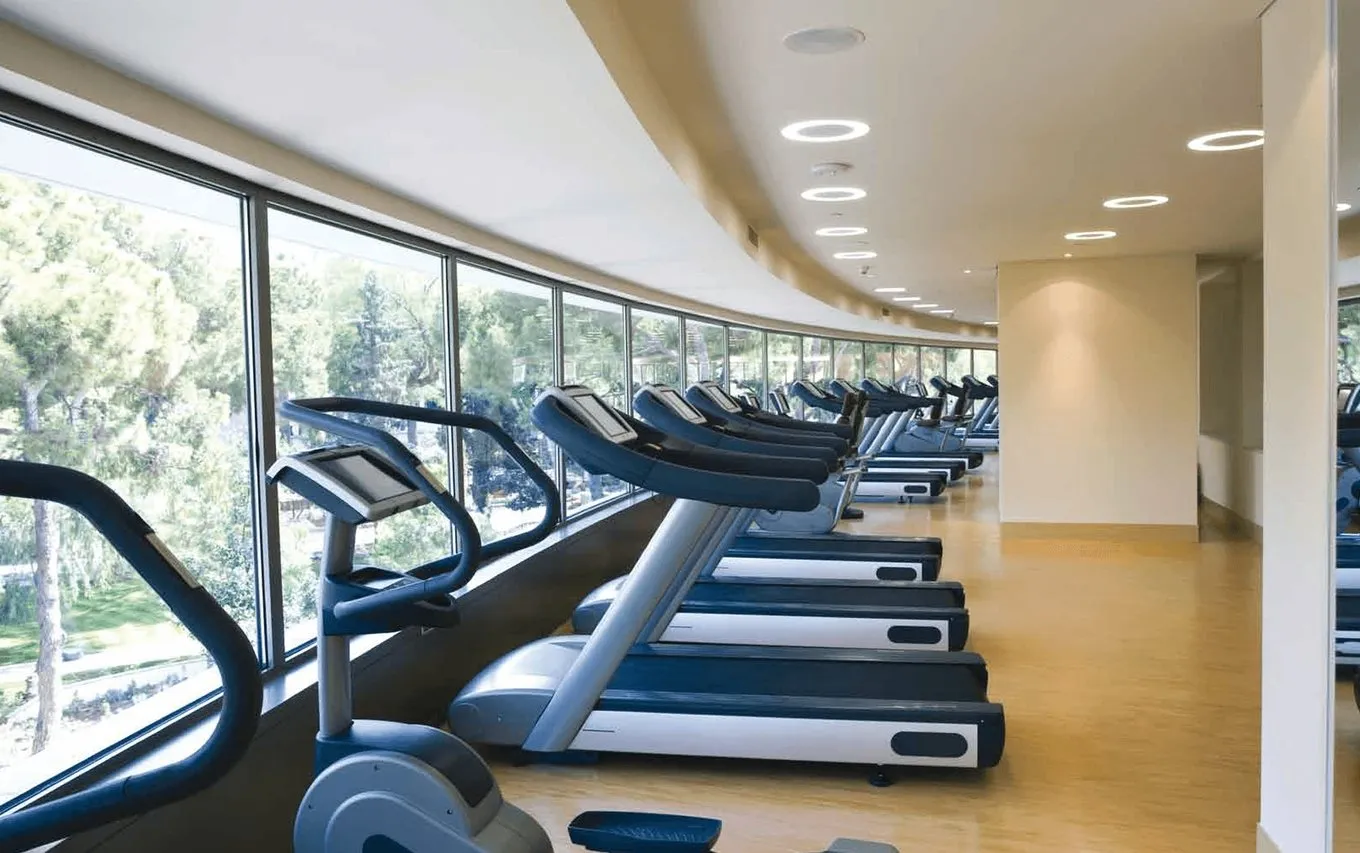 Gym with garden views