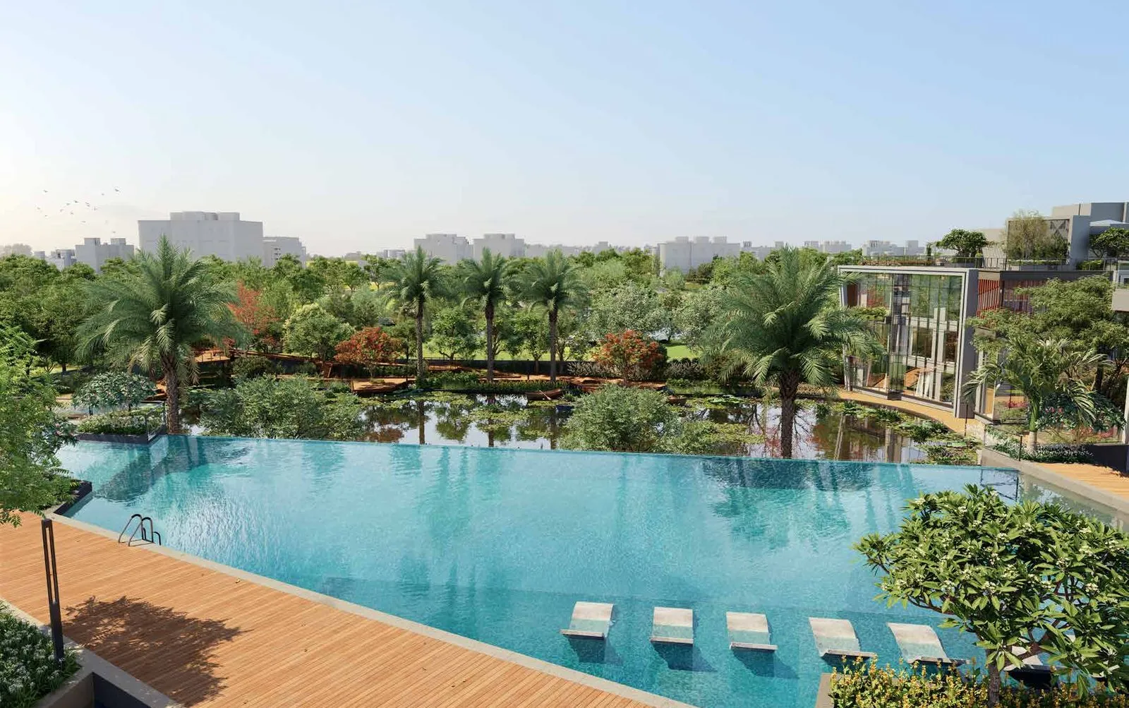 Infinity-edge swimming pool overlooking the pond at Godrej Blue